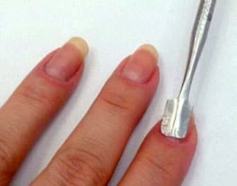 Pinza para retirar decoracion de uñas